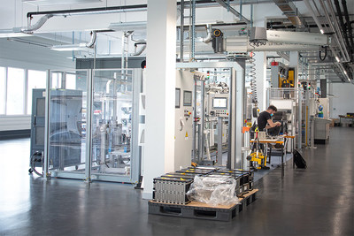 Leclanché's new module assembly line in Yverdon, Switzerland. The foreground shows the end of line tester that ensures the battery module's quality and safety.